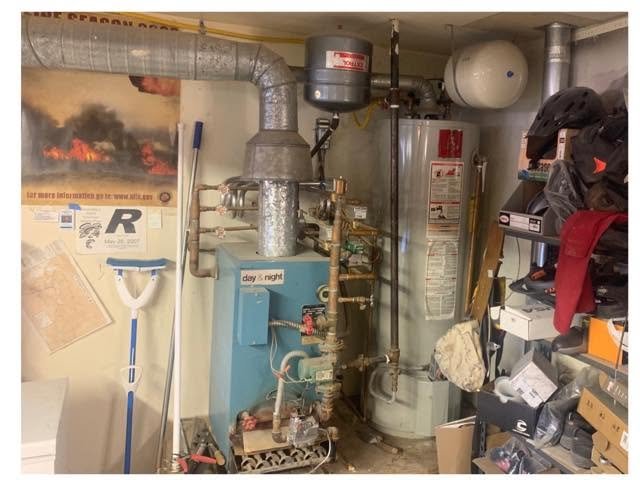Old day & night boiler and water heater before DM Mechanical upgrade in Grand Junction CO